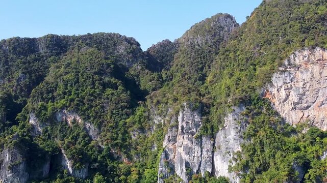 Amazing coastline of Phi Phi Don, Thailand. Aerial view on a beautiful sunny day with crystal clear ocean
