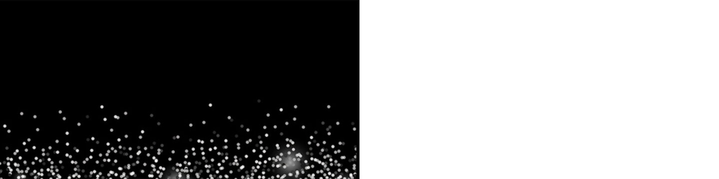 Shiny silver glitter particles falling on black background for luxury holiday celebration and festive design.