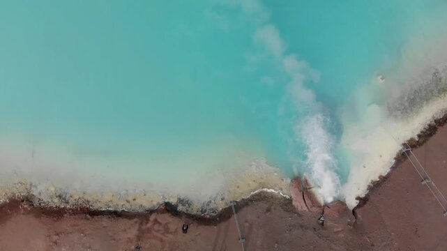 Hot geothermal pool of Hverir Myvatn Lake. Iceland blue water steam, overhead aerial view