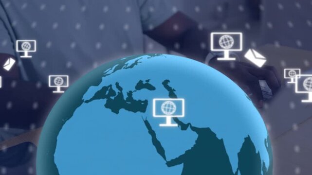 Man using laptop starting tech globe overlay, forming rotating grid and floating monitor or mail ico