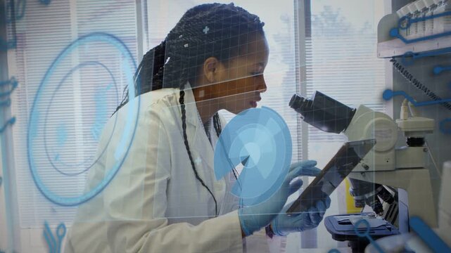 Woman tapping tablet, adjusting slide and peering through scope while blue UI guiding lab analysis