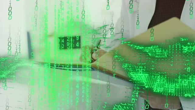 Senior medical doctor raising folder and updating records, binary code growing obscuring hands