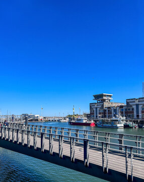OSTEND, BELGIUM - APRIL 30, 2026: Harbor bridge, marina waterfront and boats on a sunny spring day in Ostend, Belgium.