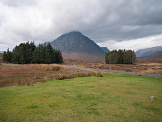 Stob Dearg, tallest peak of Buachaille Etive Mor, seen from the West Highland Way walking trail on the edge of Rannoch Moor near the Kings House Hotel in Glencoe in the Scottish Highlands. © David