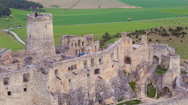 Panoramic aerial view of the historic Spis Castle ruins in Slovakia. This medieval fortress and UNESCO World Heritage site stands majestically