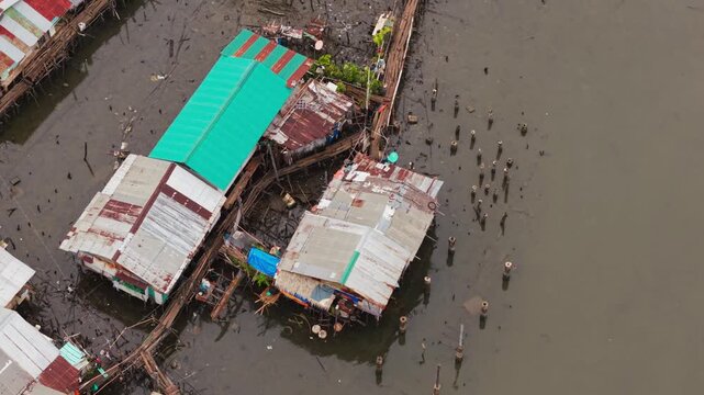 Aerial rotation reveals tropical coastline and islands in Coron, Philippines