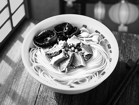Bowl of traditional Henan Hui Mian noodles with lamb and mushrooms