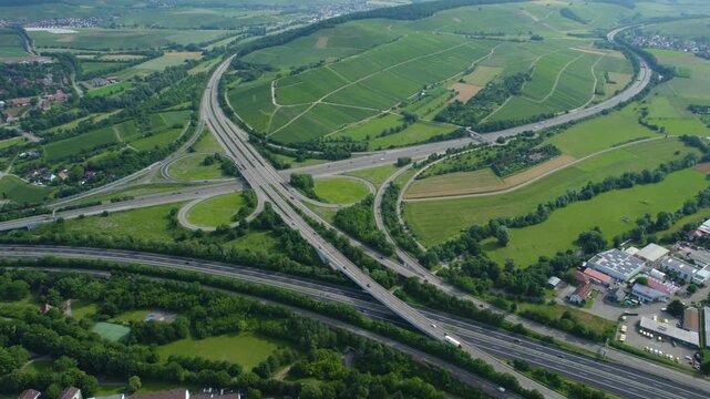 Aerial view of the freeway crossing beside the city Weinsberg in Germany on a sunny day in spring