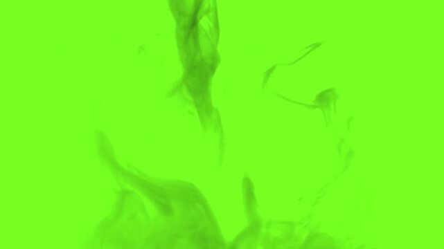 Natural black smoke rising slowly on green background for easy chroma key removal and alpha compositing. Suitable for cinematic visual effects, pollution concepts, explosion scenes, atmospheric overla