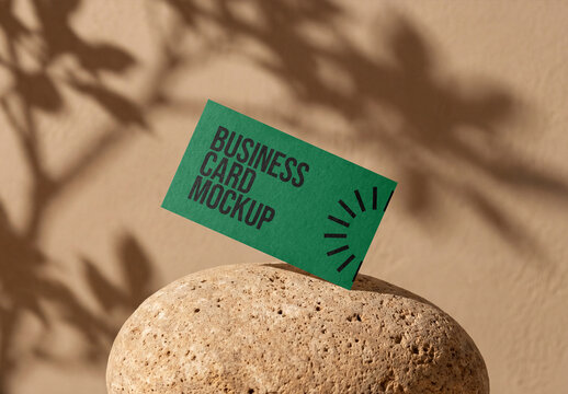 Modern Green Business Card Mockup on Natural Stone Podium with Leaf Shadow Overlay for Minimalist Brand Identity Showcase