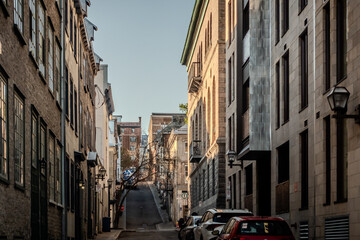 Fototapeta premium Old Quebec City Streets and Architecture with Cobblestone Roads Cafes and Historic Buildings