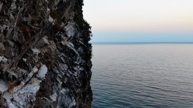 Half Cliff and Half Ocean View &ndash; Dramatic Coastal Sunset Drone Footage
