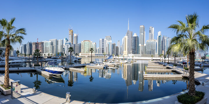 Downtown Dubai skyscrapers with Burj Khalifa skyline panorama at Marasi Bay Business Bay Canal