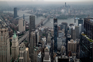 Obraz premium New York City, New York, USA - MAY 2025: Aerial skyline and harbor views from One World Trade Center observation deck in Manhattan