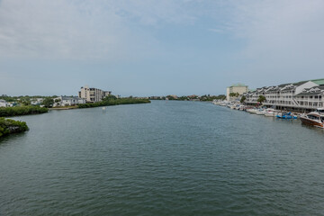 Obraz premium Clearwater Florida Waterfront Neighborhood Along Intracoastal Waterway with Residential Homes Docks and Calm Coastal Waters