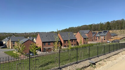 Fototapeta premium Modern residential neighborhood with brick houses at Taylor Wimpey Woodside Vale, Leeds, UK.