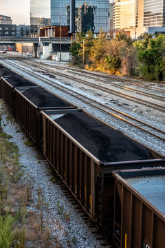  Freight Train Cars on Railway Tracks in Nashville Tennessee with Urban Buildings and Infrastructure in Background