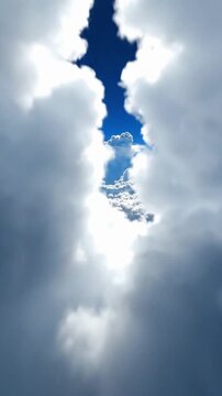 Flying through cumulus clouds at high altitude with clear skies