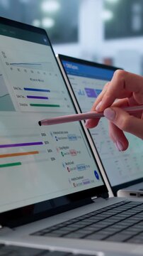 Sales Manager Reviewing Pipeline Data On Laptop