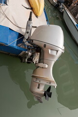 Fototapeta premium Outboard motor on small boat in Venice canal