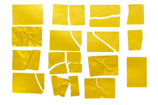 A set of torn golden yellow sticky notes isolated on a white background. A collection of crumpled and torn sticky paper pieces for creative design layouts and reminders.