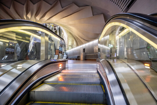  Modern Escalator in Stockholm Sweden Metro Station with Curved Architectural Ceiling and Sleek Underground Transportation Design