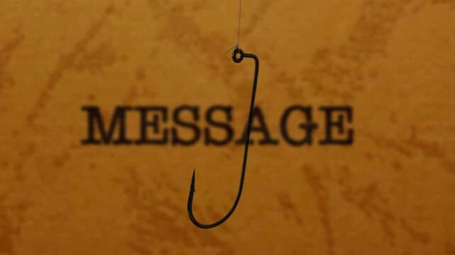 Fishing Hook Hanging in Front of Message Text