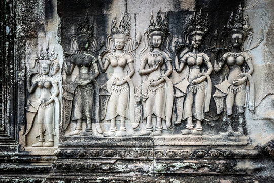 Row of Apsara Dancer Bas-Reliefs at Angkor Wat Temple