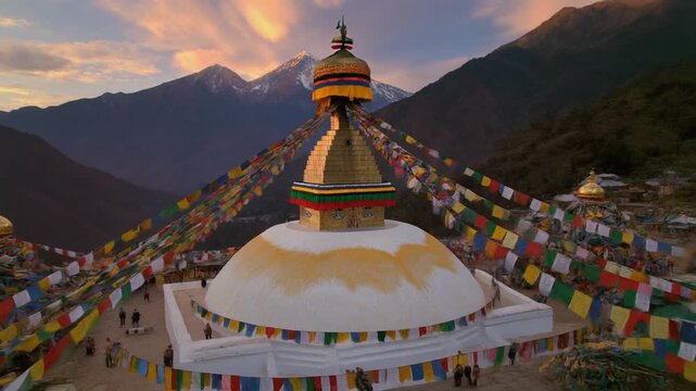 Buddhist Stupa with Prayer Flags in Himalayan Mountains at Sunset