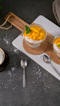 Fresh Mango Coconut Chia Pudding in Glasses with Mint Garnish