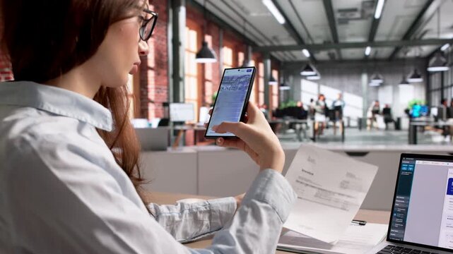 Person Uses Smartphone To Take Photo Of Receipt