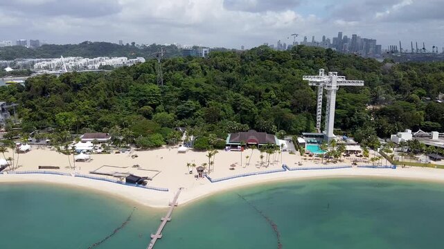 Panoramic aerial view of Siloso Beach and Sentosa Island skyline on a sunny day, Singapore