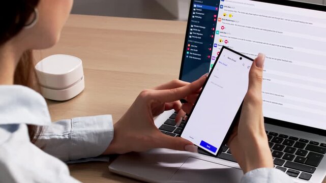 Corporate Manager Checking Client Emails On Smartphone