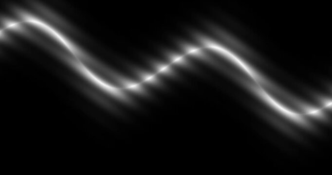 Abstract wave motion with glowing light particles on dark background.