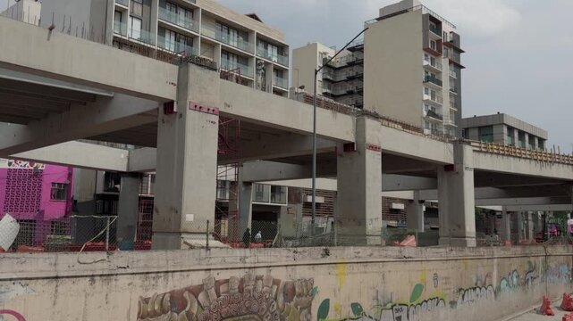 MEXICO CITY, MEXICO - MAY 8, 2026 Controversial elevated bridge construction built inches away from residential apartment buildings.