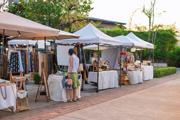 Jing Jai market, walking street market for selling general merchandise, food, clothes and more are a favorite among tourists at Chiang Mai province, Thailand. © nopporn