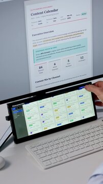 Man Using Touchscreen Monitors