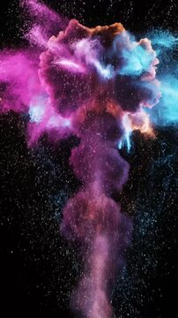 Fireworks explode in bright colors over a dark sky during a celebration at night