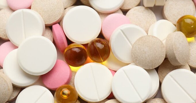Many different pills as background, top view
