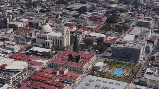 Aerial View of El Salvador's Urban Landscape Modern and Traditional Architecture Amidst Clear Skies