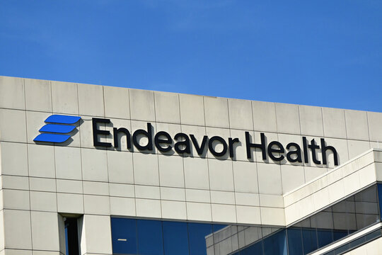 A sign on the Endeavor Health Corporate Center heralds the name of its occupant, Endeavor Health is a privately held healthcare system that operates a series of teaching hospitals and facilities.