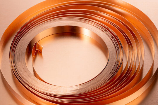 Close-up of Spiral Copper Foil with Metallic Texture
