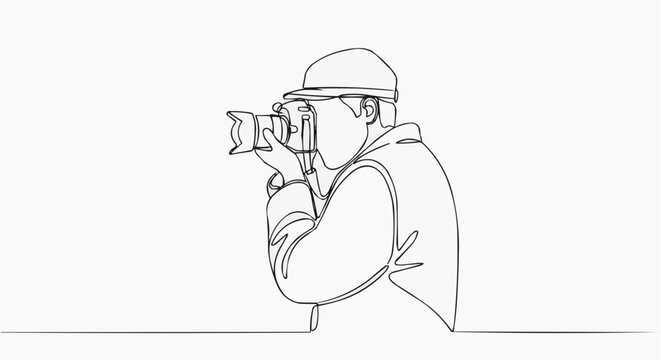 The photographer online keeps looking at the camera lens to take a picture.