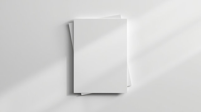 Clean blank paper stack mockup top view with soft light and subtle shadow