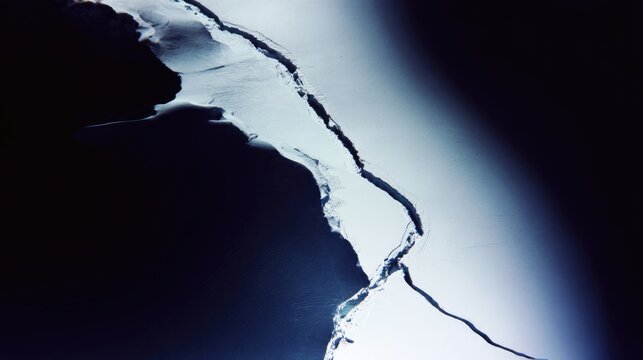 uriel. Aerial view of a deep lightning-shaped crack splitting a smooth glacier surface. travel magazines, destination branding, designed for travel destination branding, used by lab technicians.