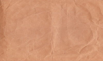 Fototapeta premium Crumpled Brown Kraft Paper Texture Background for Eco-Friendly Packaging and Vintage Craft Designs