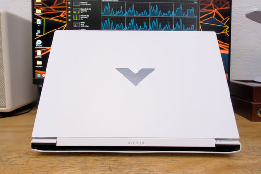 Zapopan Jalisco, Mexico - May 8, 2026: White hp victus gaming laptop on wooden desk, technology concept