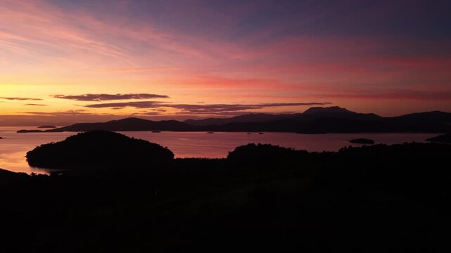Vibrant Sunset Sky Above Tropical Coast