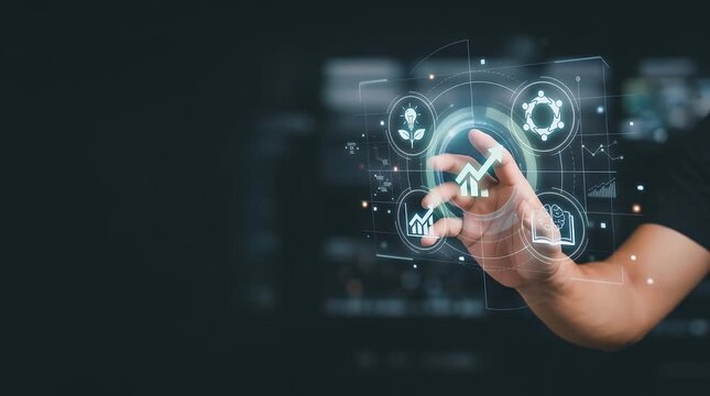 Hand touching digital interface with business analytics icons and growth charts in holographic display