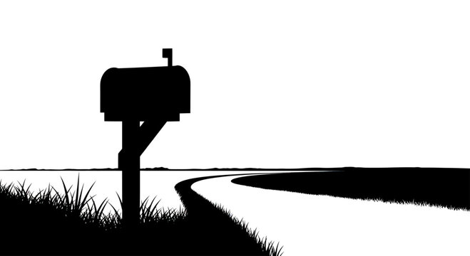 Silhouette of a solitary rural mailbox stands beside a winding road